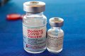 This Sept. 21, 2021 file photo shows vials of the Pfizer and Moderna COVID-19 vaccines in Jackson, Miss. Moderna is suing its main competitors Pfizer and the German drugmaker BioNTech, accusing the rivals of copying Moderna’s technology in order to make their own vaccine. Moderna said Friday, Aug. 26, 2022, that Pfizer and BioNTech’s vaccine Comirnaty infringes on patents Moderna filed several years ago protecting the technology behind its preventive shot, Spikevax. (AP Photo/Rogelio V. Solis, File)