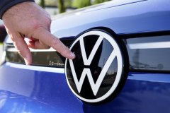 Staff file photo / In 2021, an early owner shows his Volkswagen ID.4 to the Chattanooga Times Free Press at ReMax Renaissance in Chattanooga.