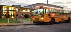 Staff Photo by Robin Rudd / Students arrive by bus, before dawn, at Orchard Knob Middle School on Aug, 9, 2021. Superintendent Justin Robertson told Hamilton County school board members Monday that the district plans to schedule community meetings to discuss the possibility of moving Orchard Knob Middle to The Howard School's campus.