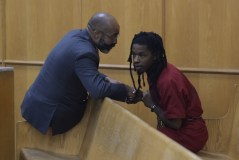 Staff photo by Mason Edwards / Defense attorney Gerald Webb confers with his client, Deshundre Vinson, 22, on Sept. 8, 2026, Vinson was arrested six days earlier and charged with first-degree murder following the death of his nephew.