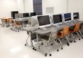 Staff file photo / Computers are ready for students in a classroom at The Howard School in 2019. Thousands of Hamilton County students recently participated in two AI studies.