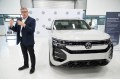 Staff Photo by Seth Carpenter/ Henning Habicht, head of Volkswagen Chattanooga operations, speaks in front of a 2027 Volkswagen Atlas during an Atlas Day celebration at Volkswagen Chattanooga on Sept. 29, 2026.