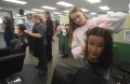 Staff photo by Matt Hamilton / Soddy Daisy Middle School students Hadley Turman, 11, back, and Khloie Muck, 13, practice hairstyling in the cosmetology area after a ribbon-cutting at the Hamilton County Schools Career Expo Center at the Franklin-Roberts Future Ready Center on Sept. 29, 2026.