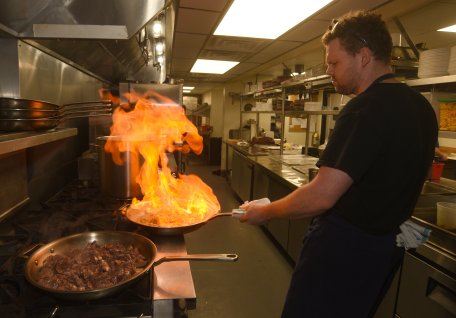 Staff photo by Matt Hamilton / Chef Joey Milenkovic prepares chicken livers at Bona Fide on Sept. 2, 2026.