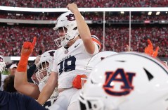 Auburn Athletics photo by Bryce Mitchell / Auburn players carry kicker Alex McPherson on their shoulders after his 34-yard field goal as time expired defeated No. 1 Georgia 27-24 Saturday in Athens.