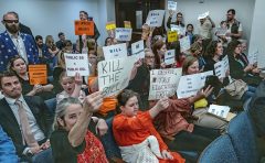 Photo by John Partipilo / Tennessee Lookout / A crowd in a Cordell Hull Legislative Building committee room expresses displeasure with Gov. Bill Lee's 2024 school voucher plan. A three-judge panel ruled in October 2026 the voucher plan doesn't violate Tennessee's constitution.