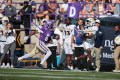 UTC photo by Willis Glassgow / UTC junior receiver Taylor Crumedy hauls in a deep pass from quarterback Battle Alberson, not pictured, ahead of Western Carolina cornerback Jayden Cornelius (6) during the first half of Saturday's game in Cullowhee, N.C. Crumedy had two 37-yard receptions and one shorter catch in the Mocs' 41-18 win.